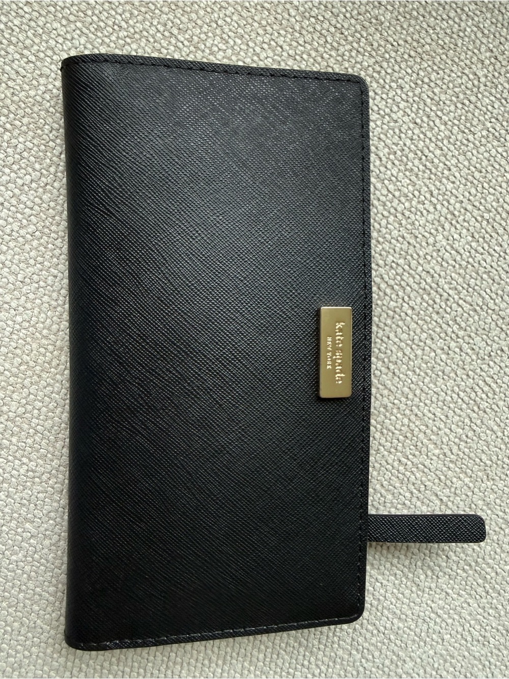 Kate spade black saffiano leather bi-fold wallet